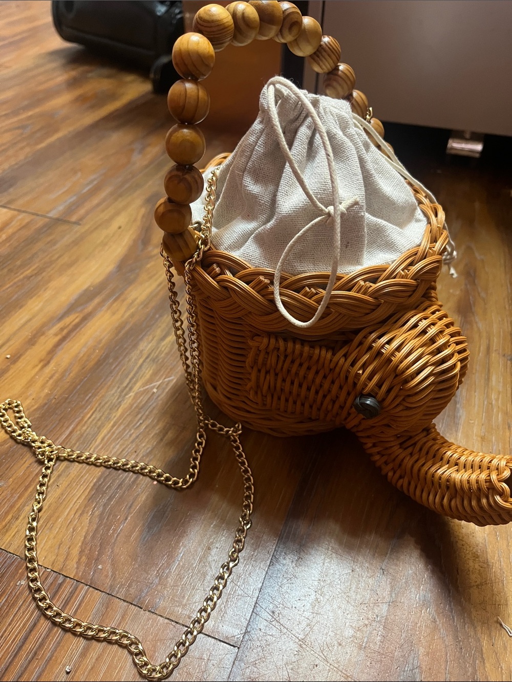 Tommy Bahama Woven Elephant Crossbody in Honey Brown with Cream Drawstring